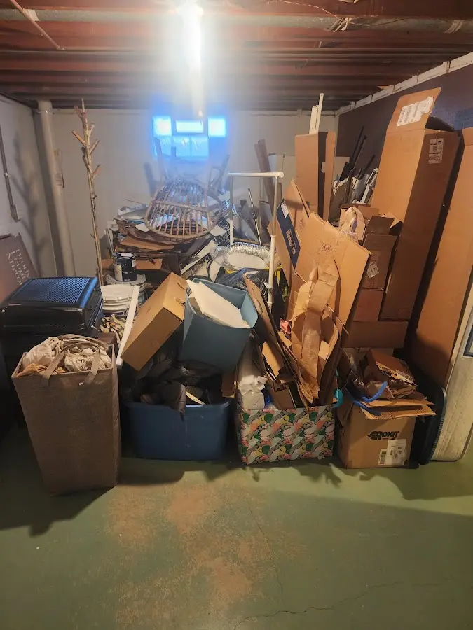 Roll-off dumpster container at job site for Construction Dumpster Rental in Portland